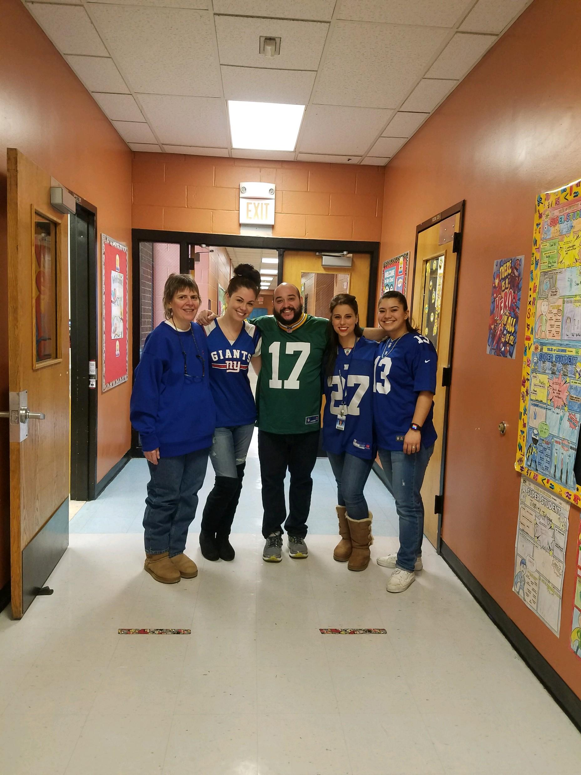 group of staff wearing their jerseys