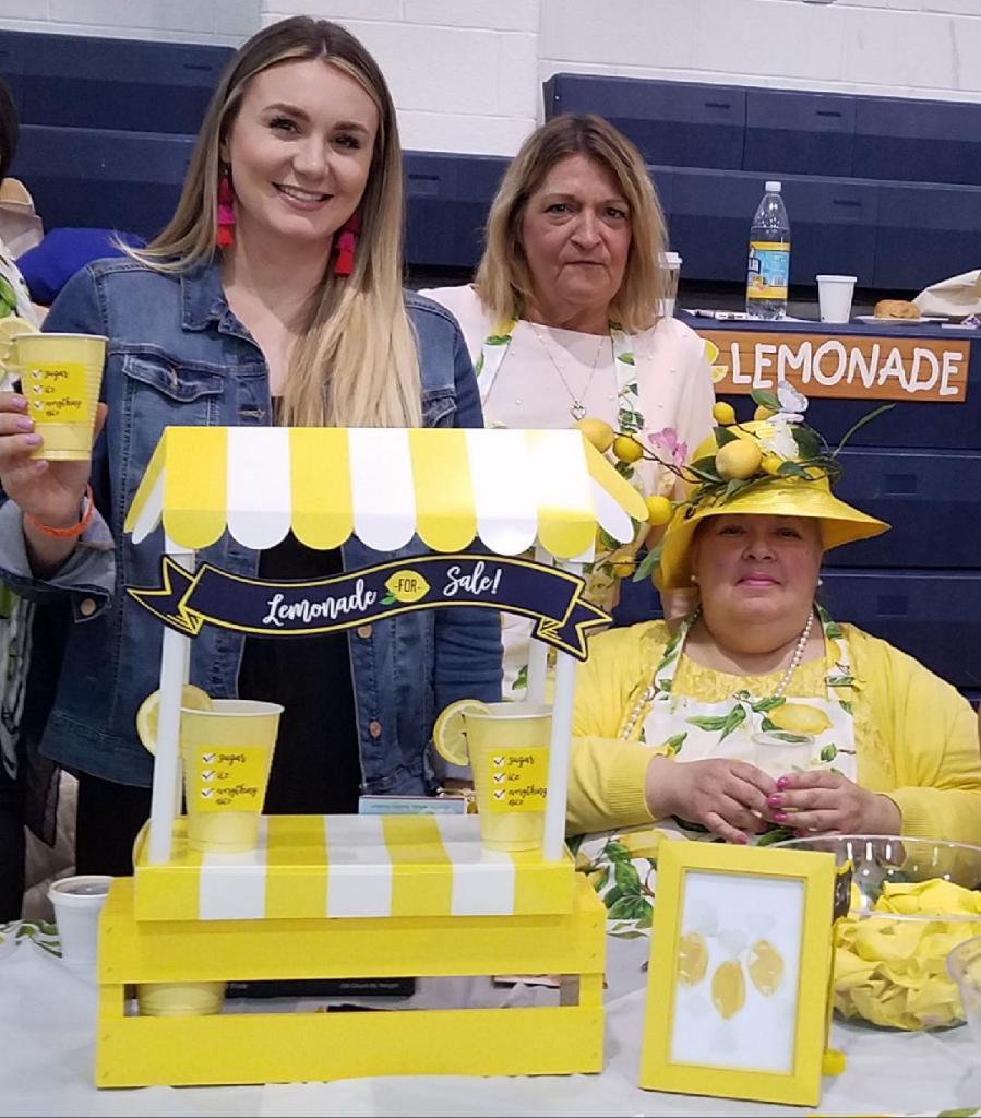 Mrs. Abbato, staff & parent liaison at the lemonade stand