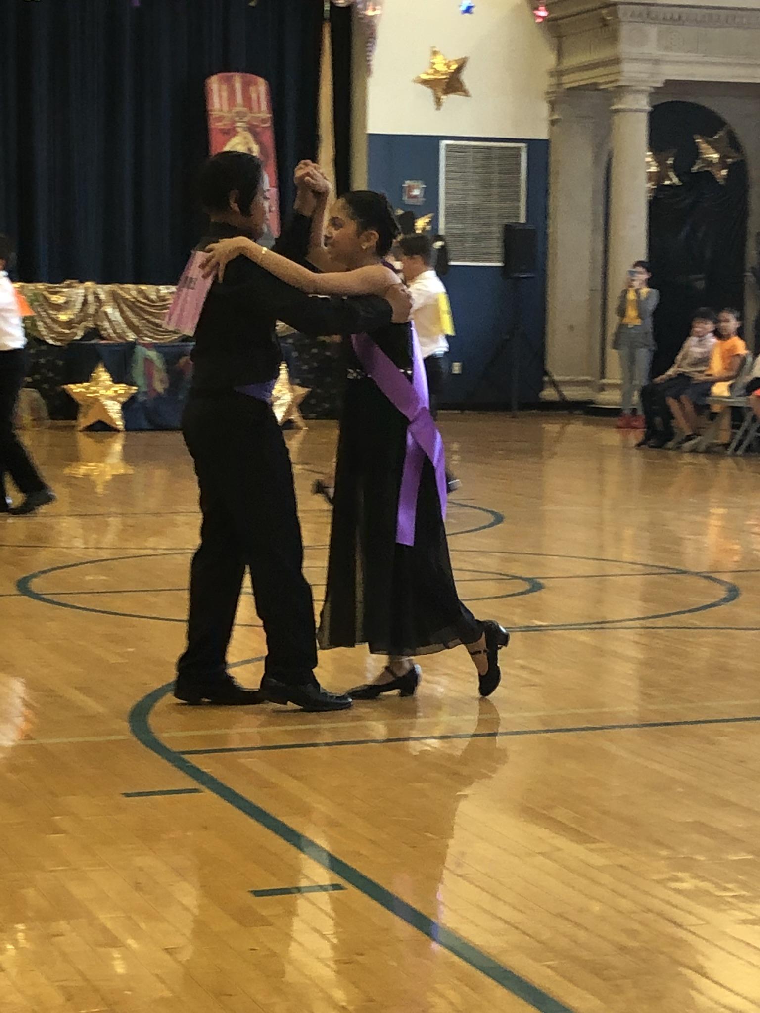 one couple dancing at the semi final competition