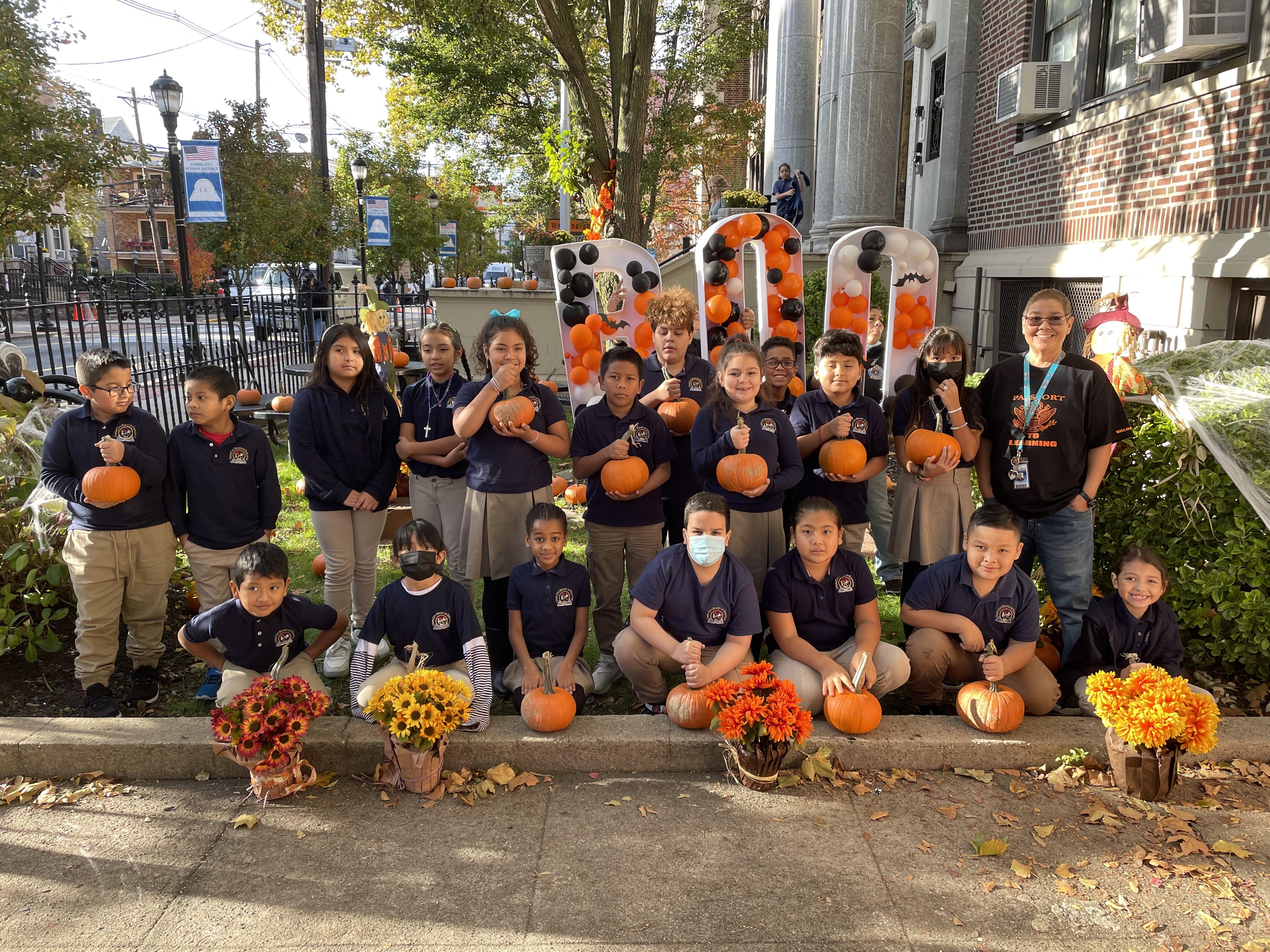 Washington School students enjoying pumpkins