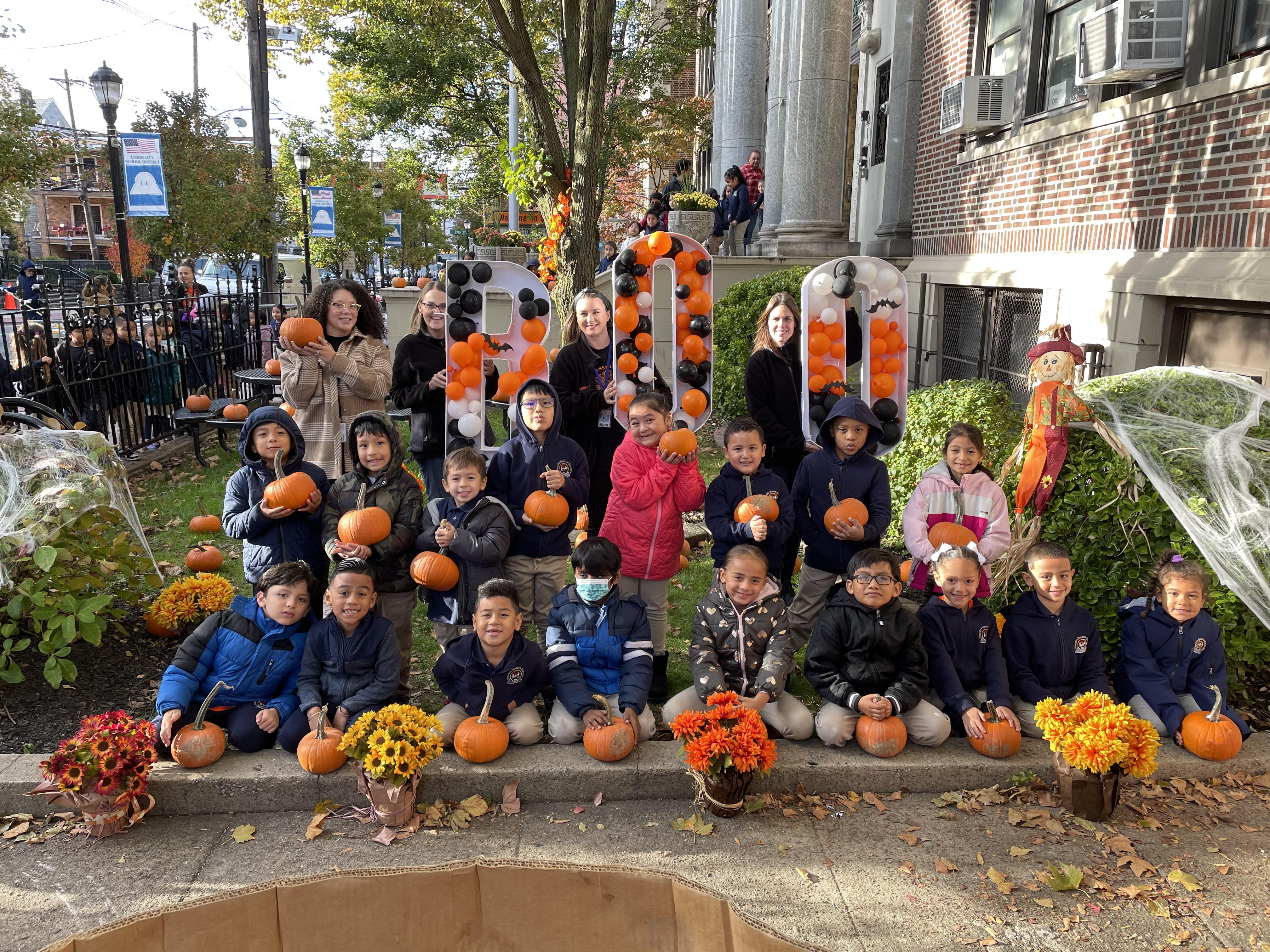 Washington School students enjoying pumpkins
